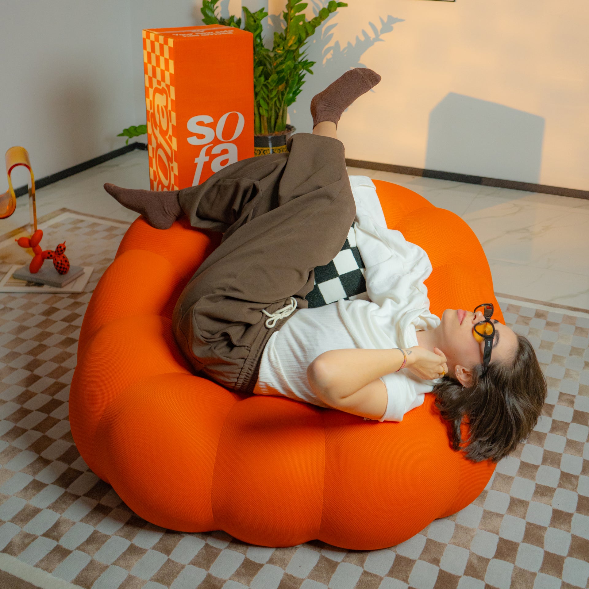 The growing sofa cosmo armchair in Boucle - Orange