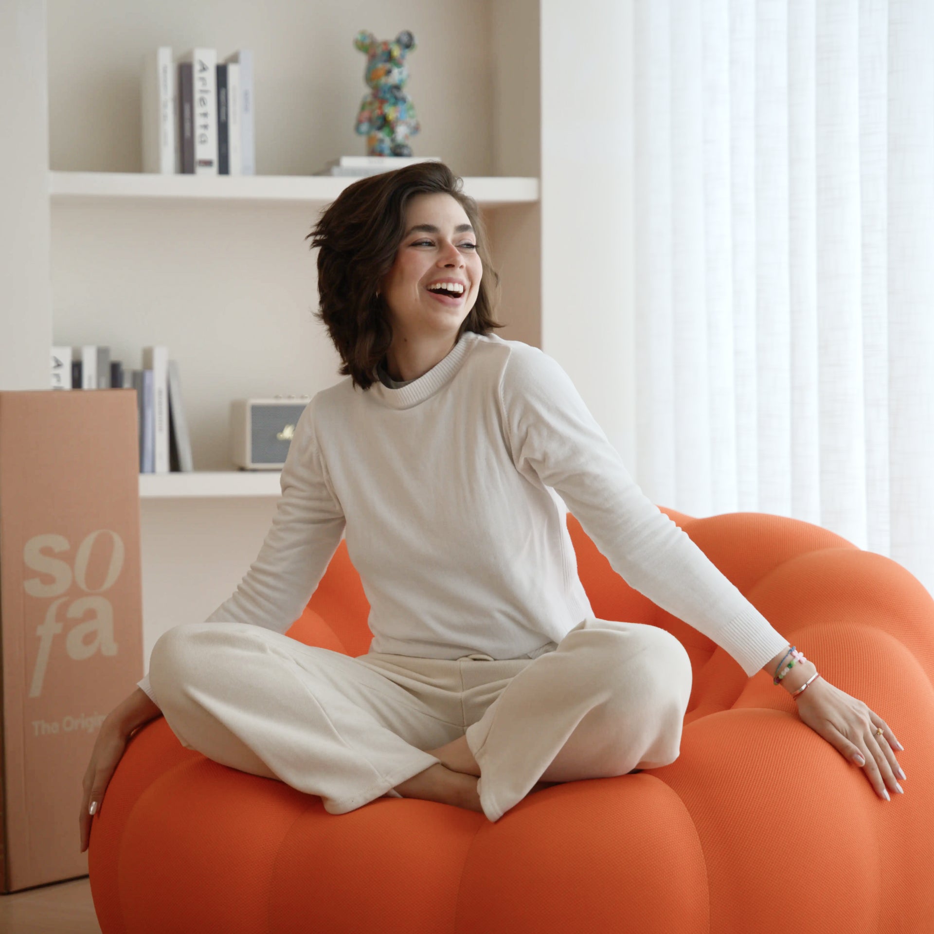 The growing sofa cosmo armchair in Boucle - Orange