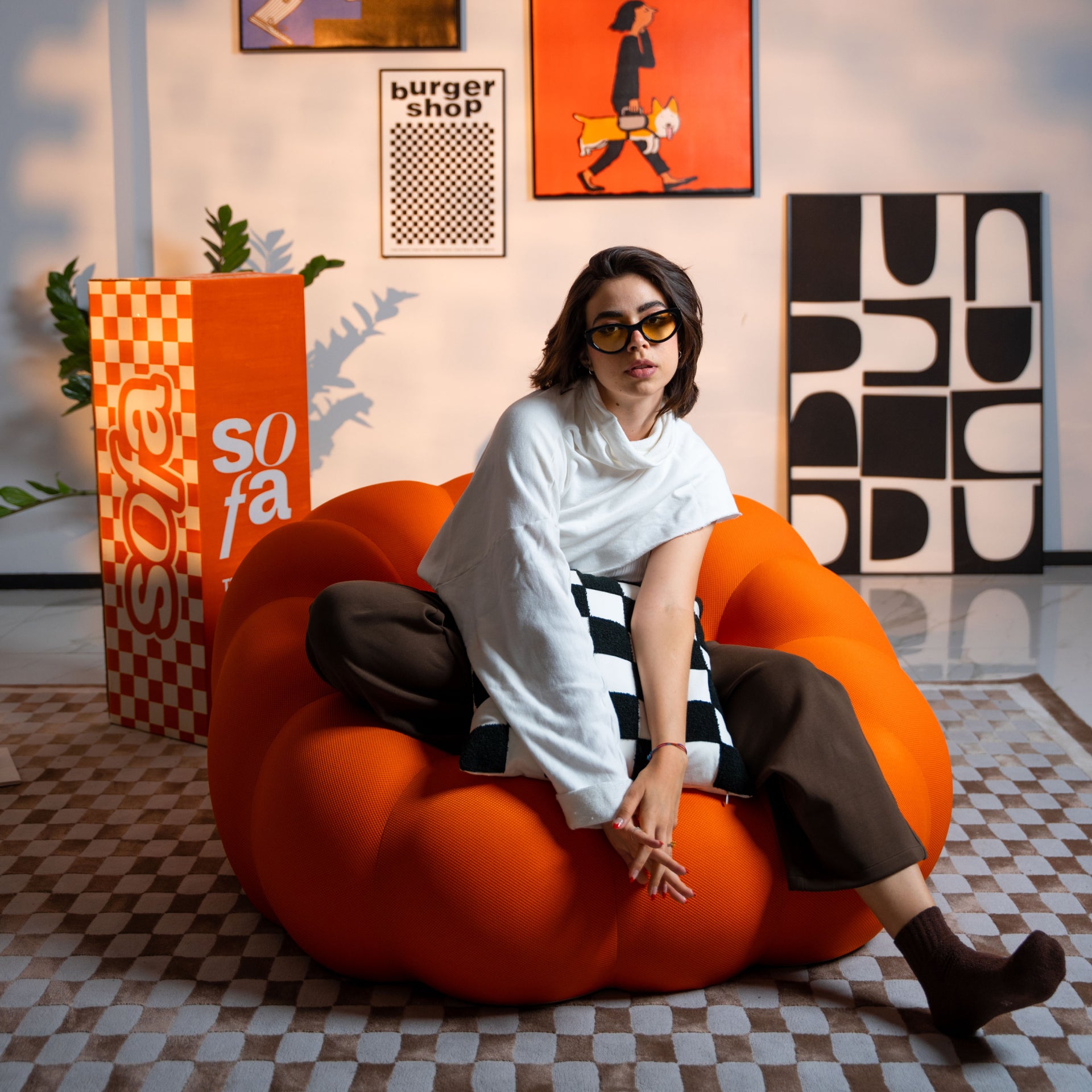 The growing sofa cosmo armchair in Boucle - Orange