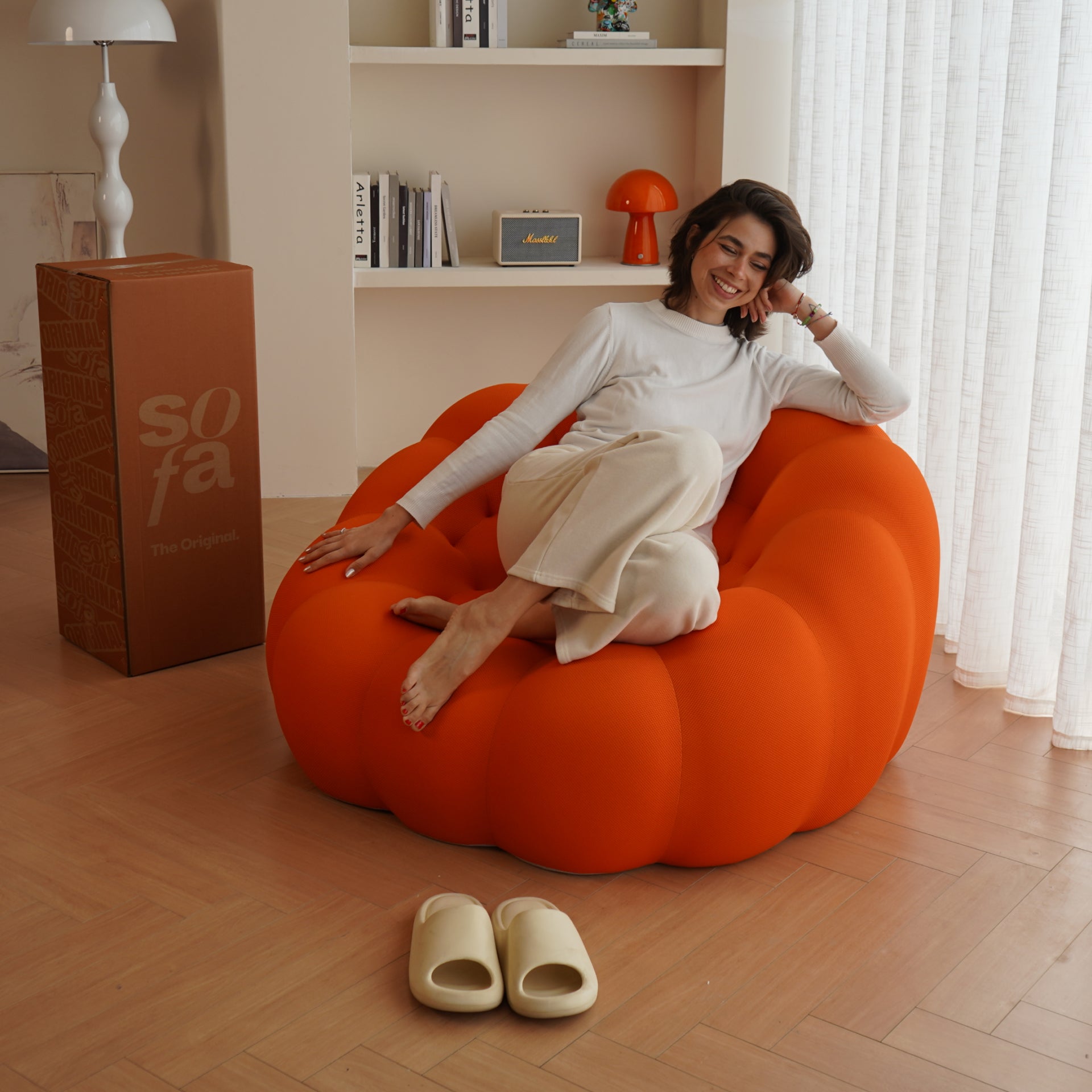 The growing sofa cosmo armchair in Boucle - Orange