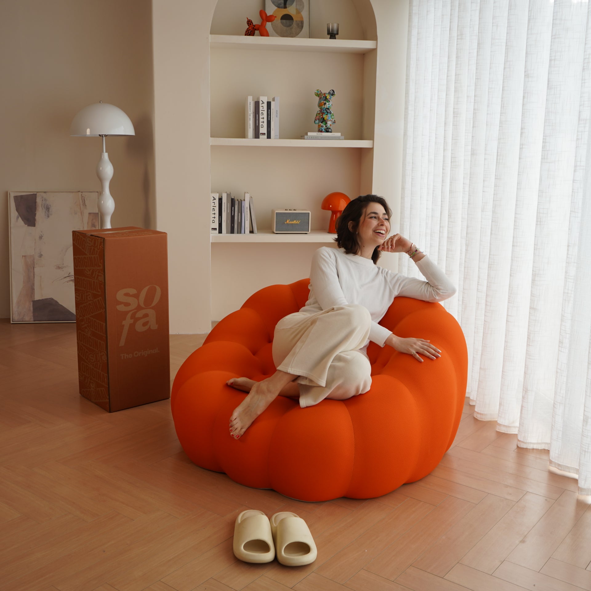The growing sofa cosmo armchair in Boucle - Orange