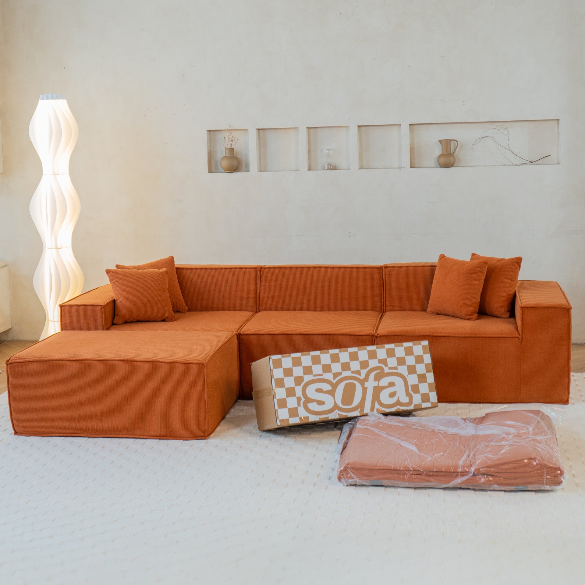 The growing sofa Pelion 3 seats + 1 chaises in Boucle - Orange